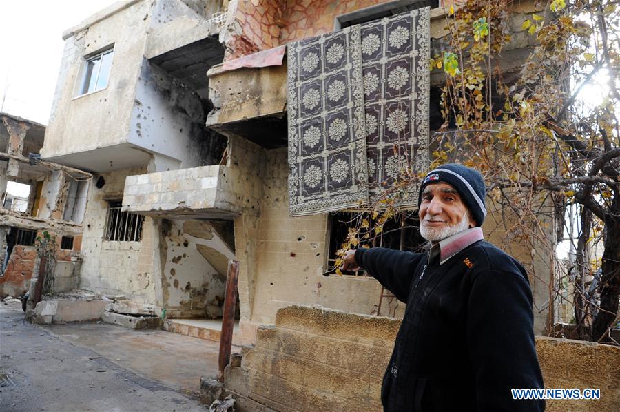 SYRIA-ZABADANI-WAR-RAVAGED CITY-FAMILIES-RETURNING