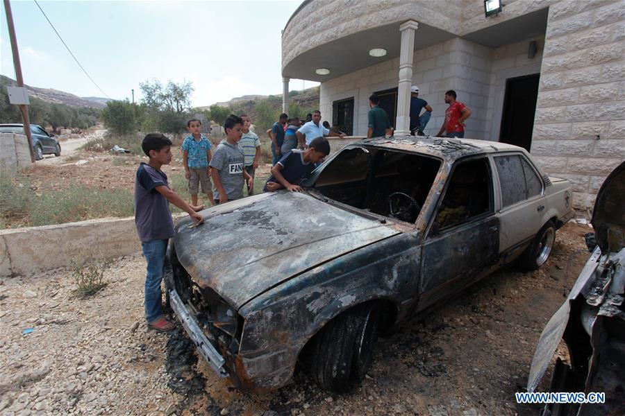 MIDEAST-NABLUS-BURN-CARS