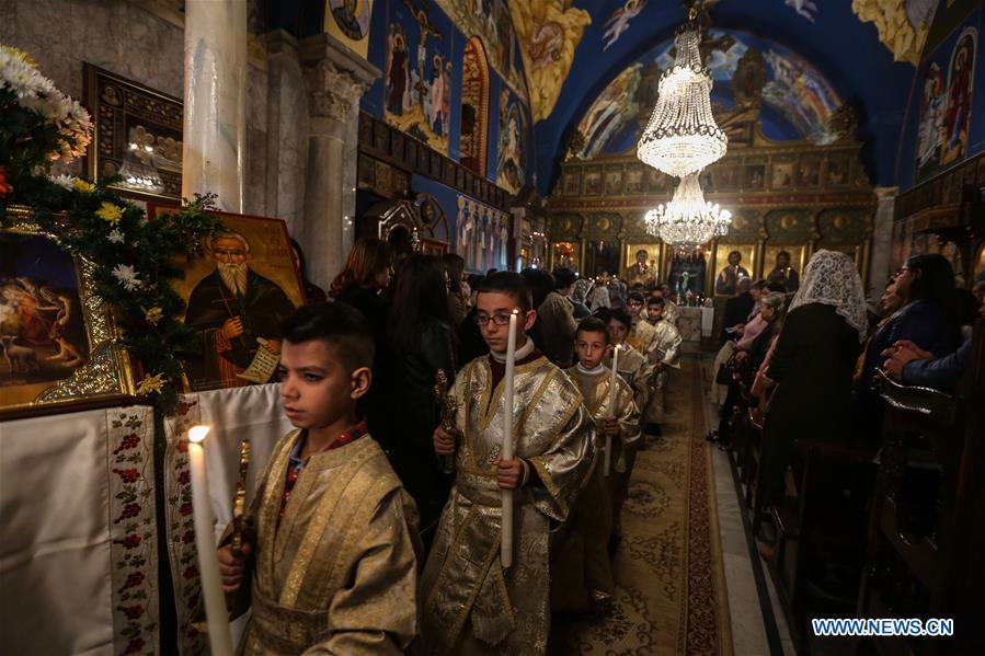 MIDEAST-GAZA-CHRISTMAS-MASS