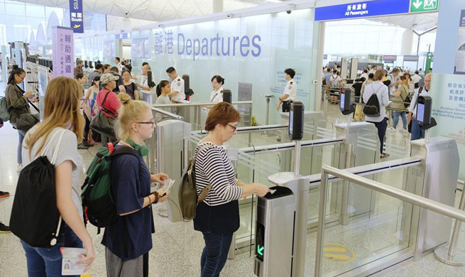 Hong Kong airport resumes operation after protest-forced halt