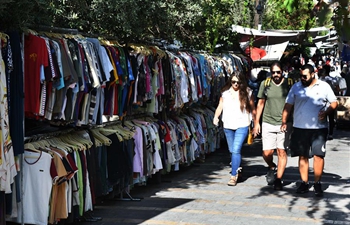 People prepare for upcoming Eid al-Adha festival in Damascus, Syria