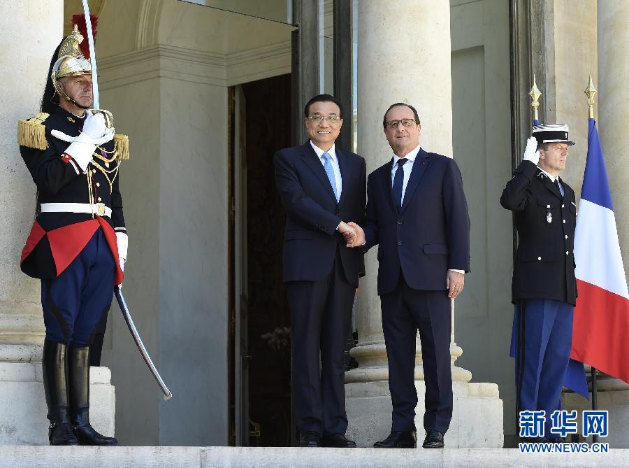 当地时间6月30日下午，国务院总理李克强在巴黎爱丽舍宫会见法国总统奥朗德。 新华社记者李学仁摄